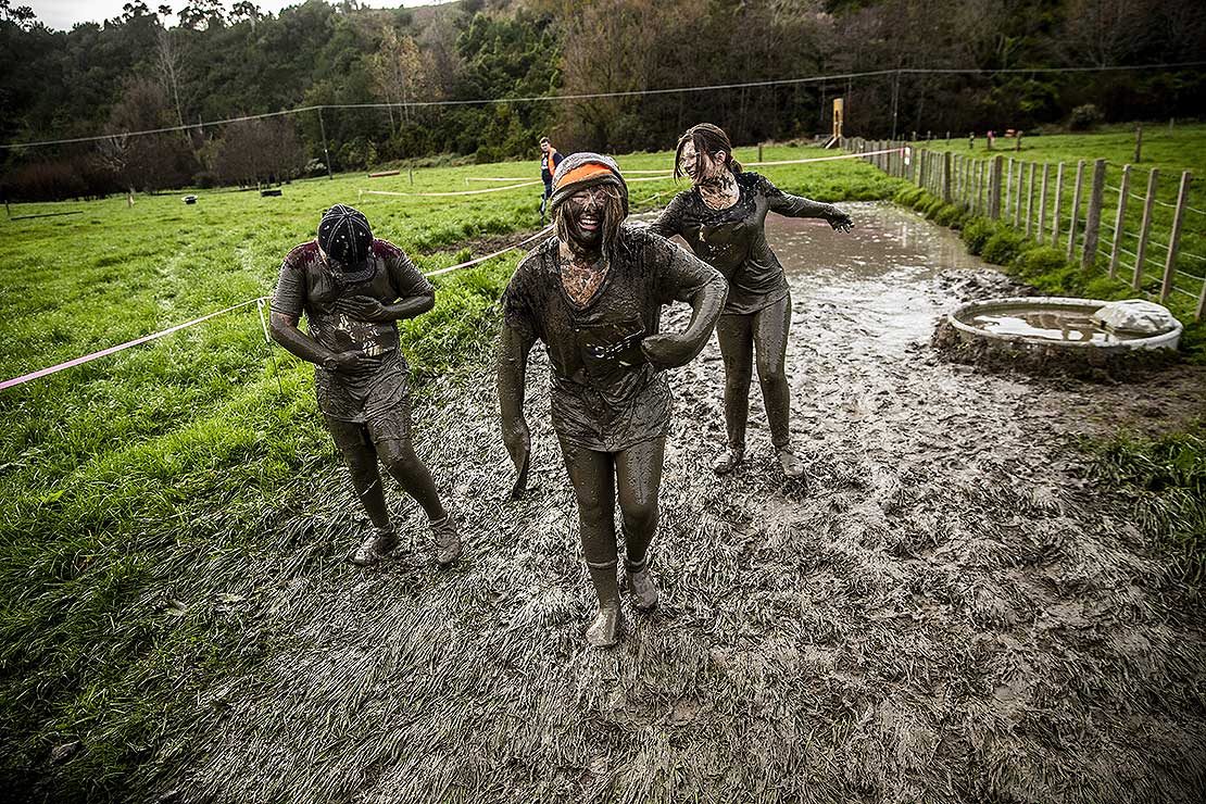 Muddy runners during the Tough Guy and Gal Challenge